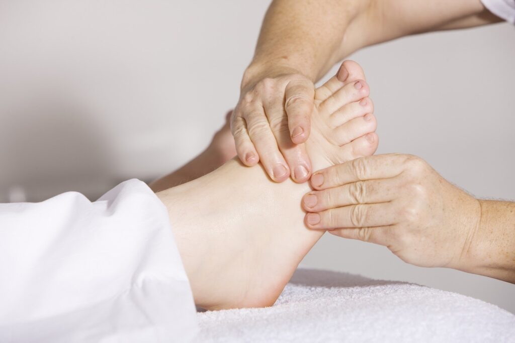 a foot affected by diabetic neuropathy pain being massaged