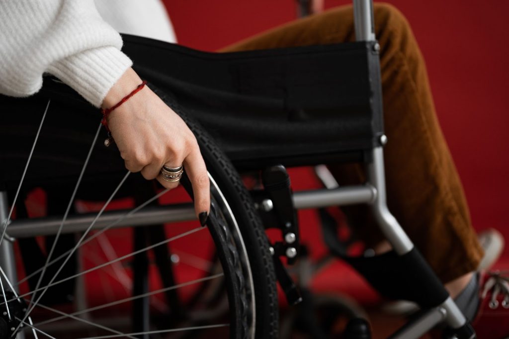 a woman with complex regional pain syndrome in a wheelchair